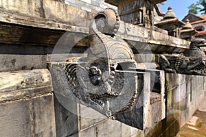 Carved stone public fountain. Pashupatinath, Nepal