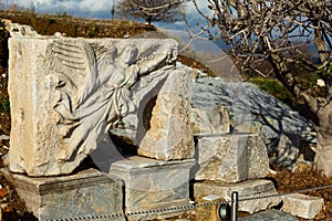 Stone carving of goddess Nike at ruins of Ephesus, Turkey