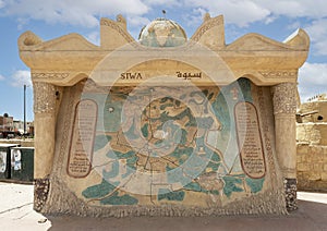 Carved stone relief map of the Siwa Oasis in Egypt, located along the main street of Siwa. photo