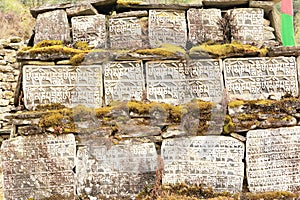Carved stone tablets prayer. Everest region, Himalayas