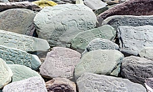 Carved stones at the historic Lamayuru Buddhist Monastery in India