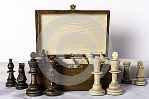 Carved Wood Chess Pieces on white background