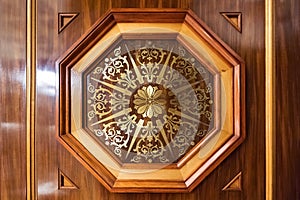Carved wood door inlaid with gold