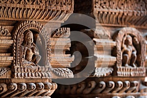 Carved wood wall decoration in Patan Durbar Square royal medieval palace and UNESCO World Heritage Site. Lalitpur, Nepal photo