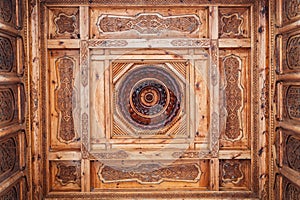 carved wooden ceiling with oriental pattern Uzbek ornament in Museum of Victims of Political Repression in Tashkent in