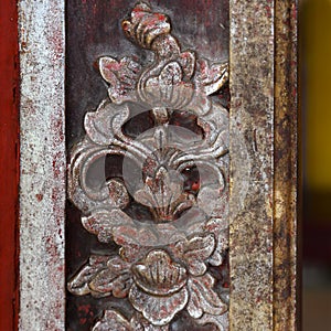 Carved wooden decoration on building of the Citadel, Imperial City Hue, Vietnam.