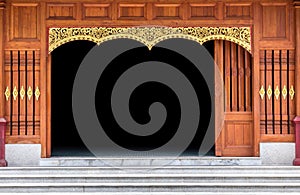 Carved wooden door in the temple. decoration of wood pattern