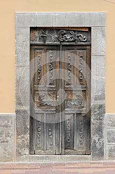 Carved Wooden Door in a Wall