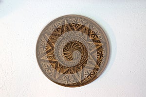 Carved wooden plate.