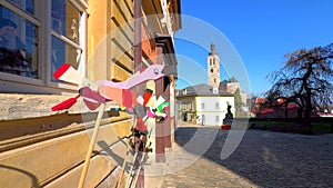 Carved wooden wind spinner toys, Barborska Street, Kutna Hora, Czech Republic