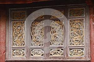 Carved wooden windows in the ancient city of Lijiang, Yunnan, China