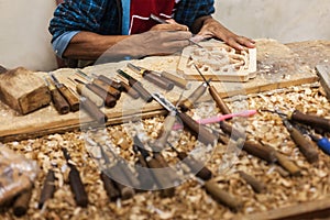 Carver in wood working photo