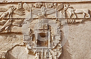 Carving of animals on wall