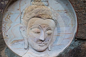 Carving Buddha art on rock in Huai Pha Kiang temple