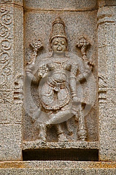 Carving details on the outer wall of Hazara Rama Temple. Hampi, Karnataka