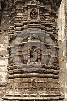 Carving details on the outer wall of Jhulta Minara, Ahmedabad, Gujarat, India photo