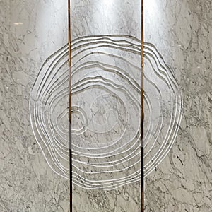 Carving irregular round on White Marble as Wall Background