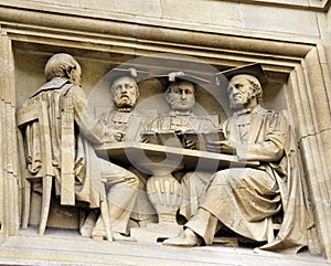 A Carving of Learned Gentlemen photo