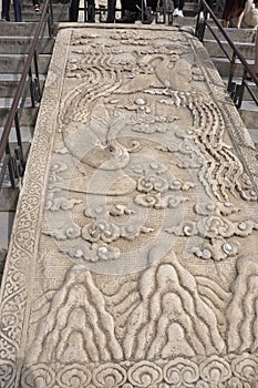 Carving ornaments in marble from stairs of Hall of Prayer for Good Harvests from Temple of Heaven in Beijing