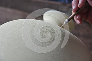 Carving picture and pattern on Porcelain vase - Jingdezhen - Jiangxi Province - China