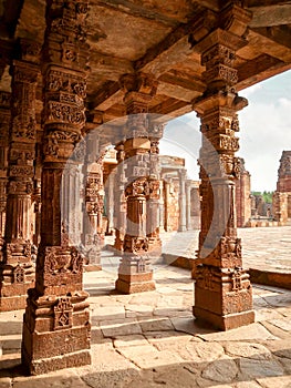 Carving pillars in Qutub Minar in New Delhi, India