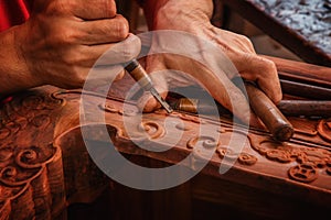 Carving and polishing of mahogany furniture