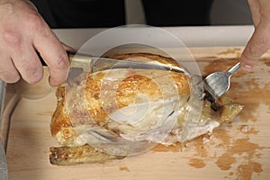 Carving a roast chicken