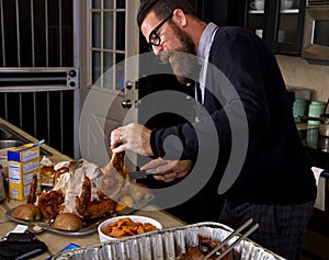 Carving The Thanksgiving Holiday Dinner Turkey