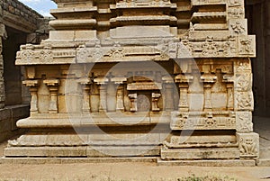 Carvings on the left side of the plinth. North Gopura of the inner courtyard, Achyuta Raya temple, Hampi, Karnataka. Sacred Center