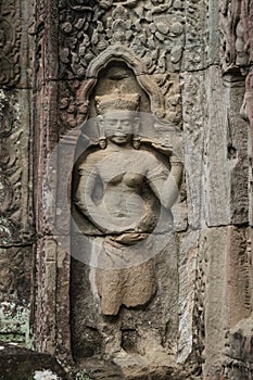 Carvings of Mrs. Apsara at Tasom Temple