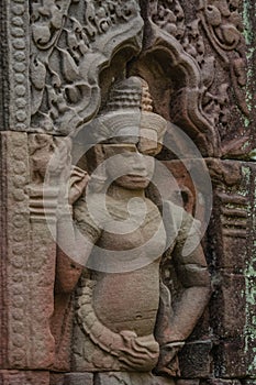 Carvings of Mrs. Apsara at Tasom Temple