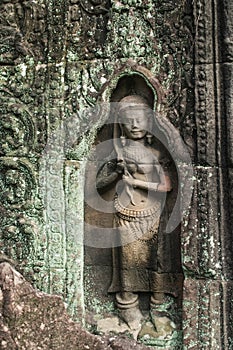Carvings of Mrs. Apsara at Tasom Temple
