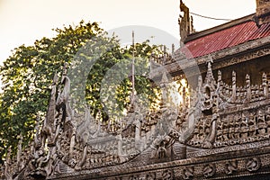 Carvings on top of Shwenandaw Kyaung Temple or Golden Palace Monastery in Mandalay, Myanmar