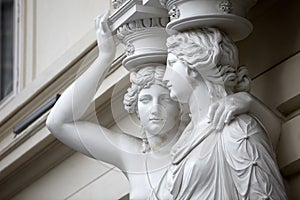 Caryatid. Statues of two young women in Vienna