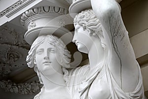 Caryatid. Statues of two young women in Vienna