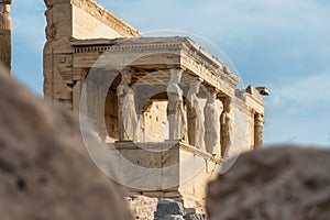 Caryatids statues at Erechtheion temple in Acropolis of Athens, Greece. Erechtheum is an ancient Greek Ionic temple of