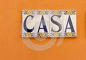 CASA tiled on wall