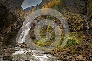 Cascada Del Estrecho  Estrecho waterfall in Ordesa valley, in Autumn season photo