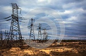 cascade of power lines. electricity distribution station in storm.