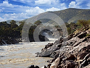 cascade of Ruacana Falls lies on the border of Namibia and Botswana