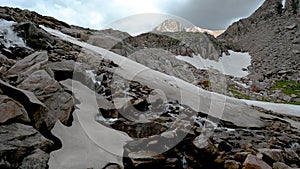 Cascade in stormy alpine area of Rocky Mountain National Park