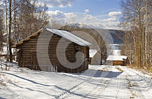 Cascade of three ancient water mills in Irkutsk architectural and ethnographic Museum `Taltsy`, Irkutsk region