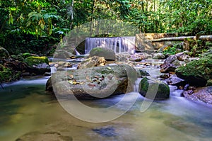 Cascades of waterfall over rock ledges