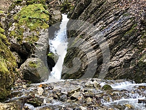 Cascades and waterfalls on the creek under the Alp Sigel peak in Alpstein mountain range and Appenzellerland region