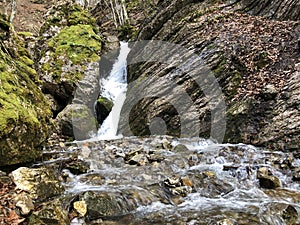 Cascades and waterfalls on the creek under the Alp Sigel peak in Alpstein mountain range and Appenzellerland region