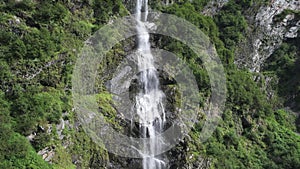 The cascading Bridal Veil Falls in Valdez, Alaska