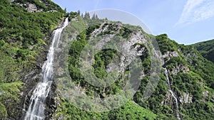 The cascading Bridal Veil Falls in Valdez, Alaska