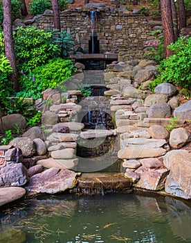 Cascading fountain with a stones in landscape design