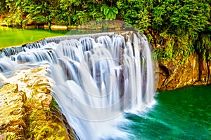 Cascading Shifen Waterfall in Pingxi, New Taipei City, Taiwan