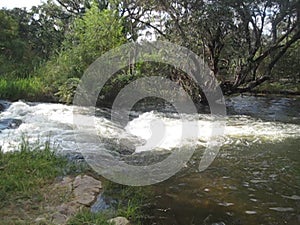 CASCADING WATER IN THE KAVANGO RIVER IN NAMIBIA